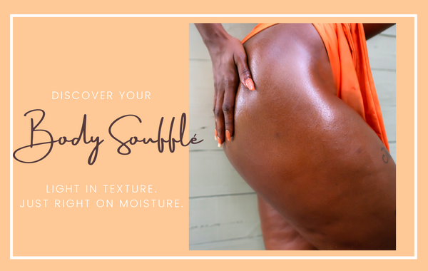 Woman applying body souffle to her butt